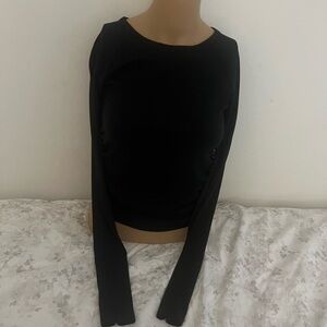Ribbed sides hour glass enhancing black long sleeve top